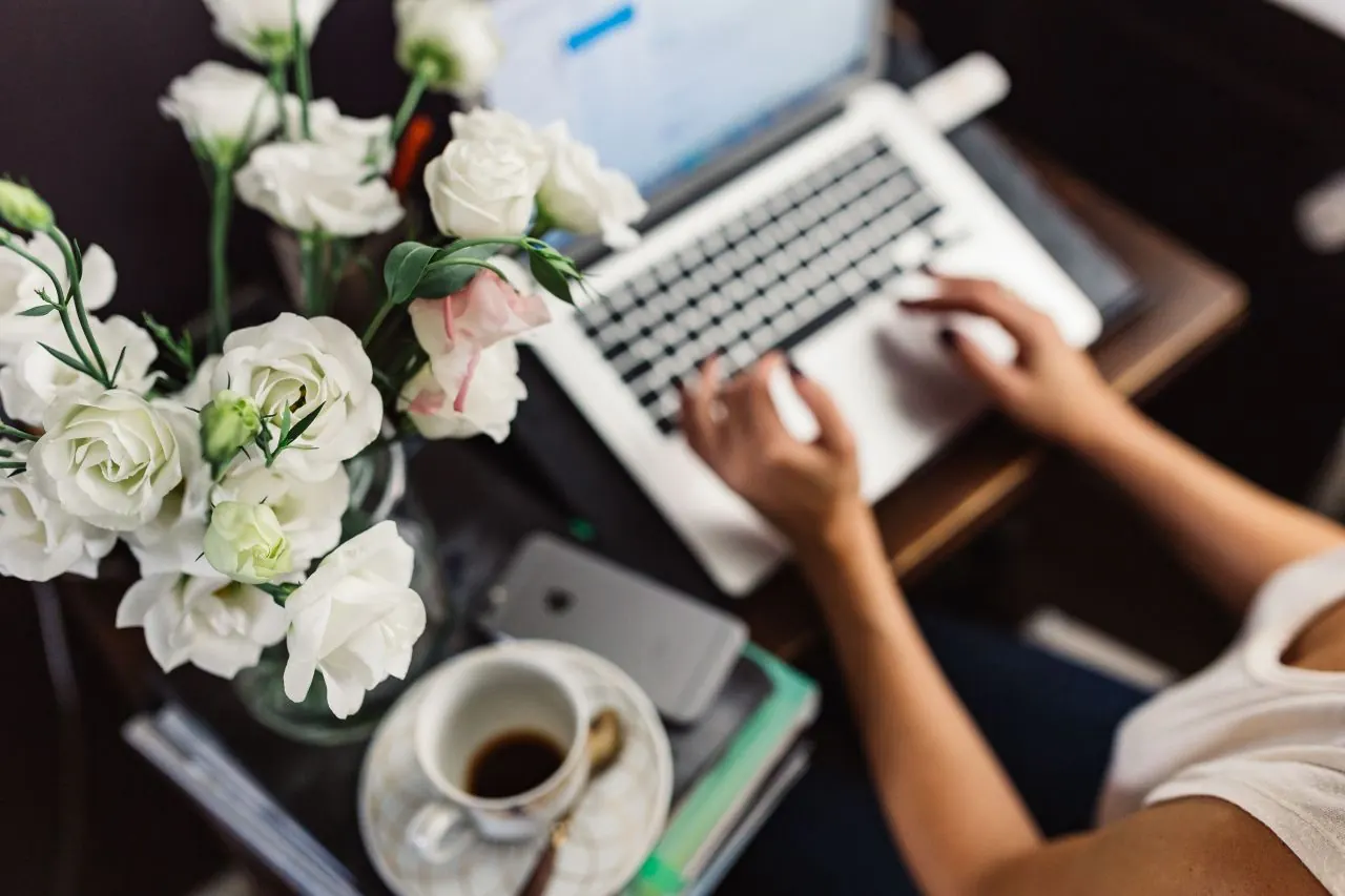Woman building an email campaign on her laptop